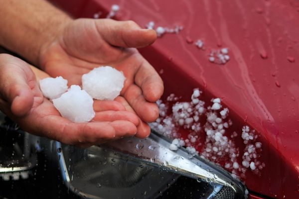 Hail damage on a vehicle awaiting a collision repair