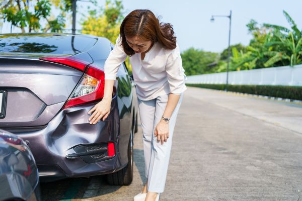 Car crashed at rear bumper. Road accident from careless drive