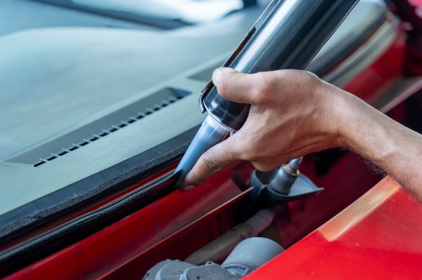 A vehicle having an auto glass replacement procedure