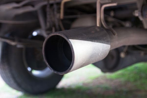 Exhaust pipe in the pickup truck, it looks dirty.