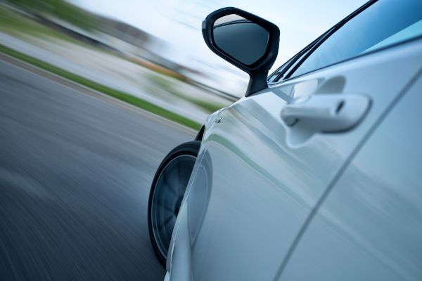 fast cornering with car, bumper view