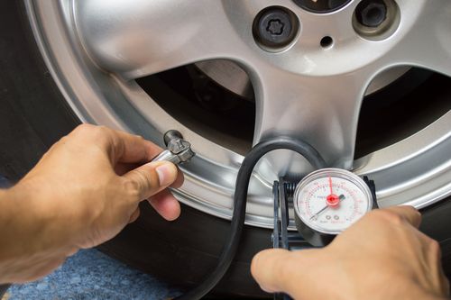 filling up tires with air