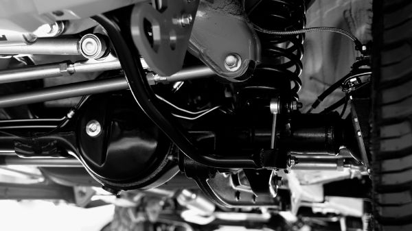 Vehicle suspension part. Close up of a rear vehicle suspension