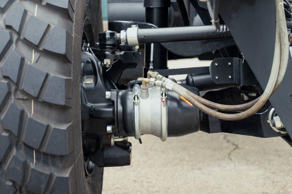 Underneath View of a Semi Truck or Trailer Rear Axle with the Suspension, Brake Cylinder Pod.