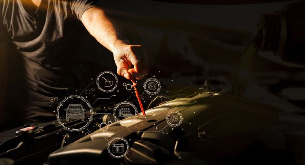 car mechanic servicing a vehicle
