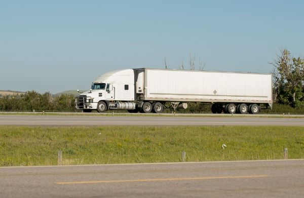 A heavy duty diesel truck on the road