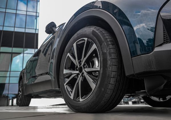 Seasonal tire swap with durable wheels and rims for year-round safety