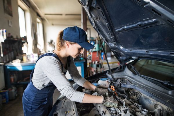 mechanic working on engine