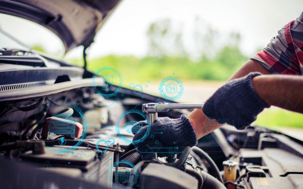 mechanic working on vehicle