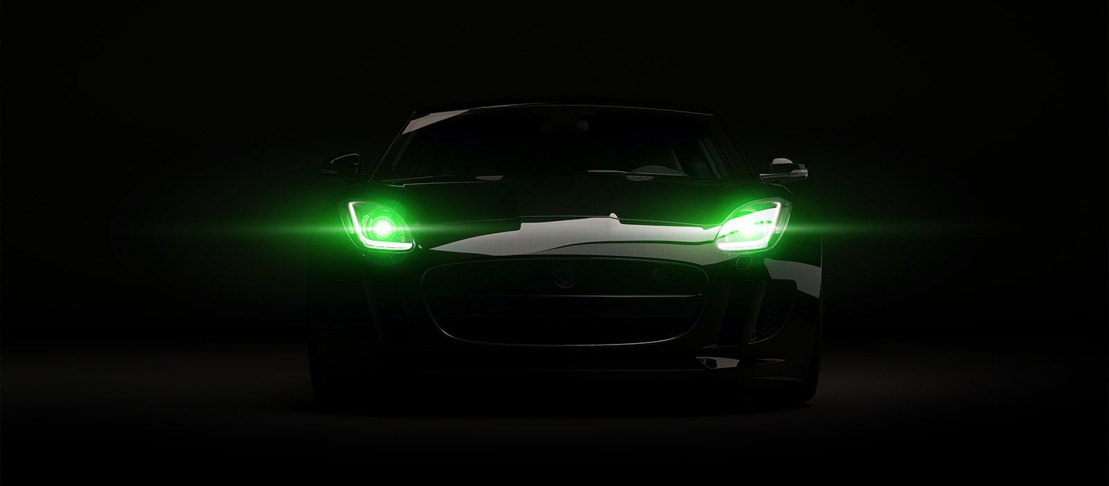 jag with green headlights