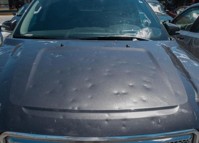 Use Paintless Dent Repair (PDR ) to fix hail stone damage to cars by booking at Anderson's Autobody